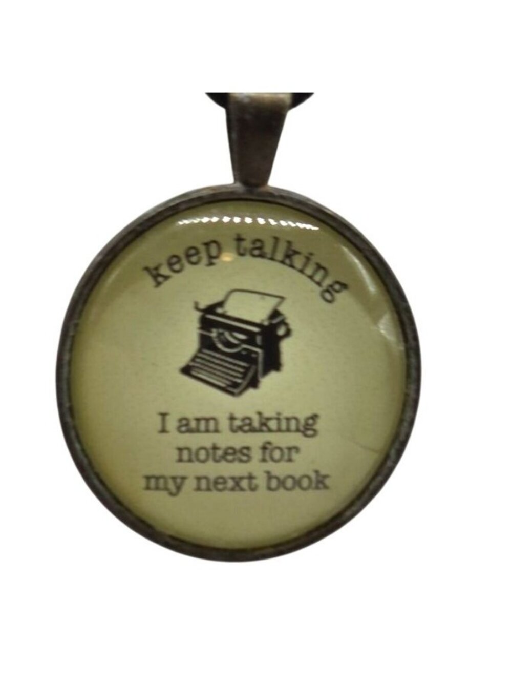 Keep Talking Pendant Necklace With Typewriter Design & Quote On Black Cord